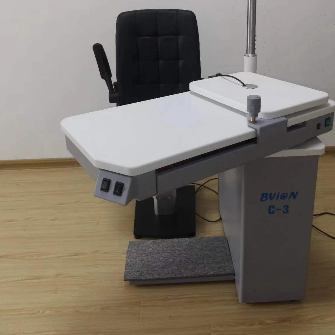 C-3 — The unit installed, with chair and footrest