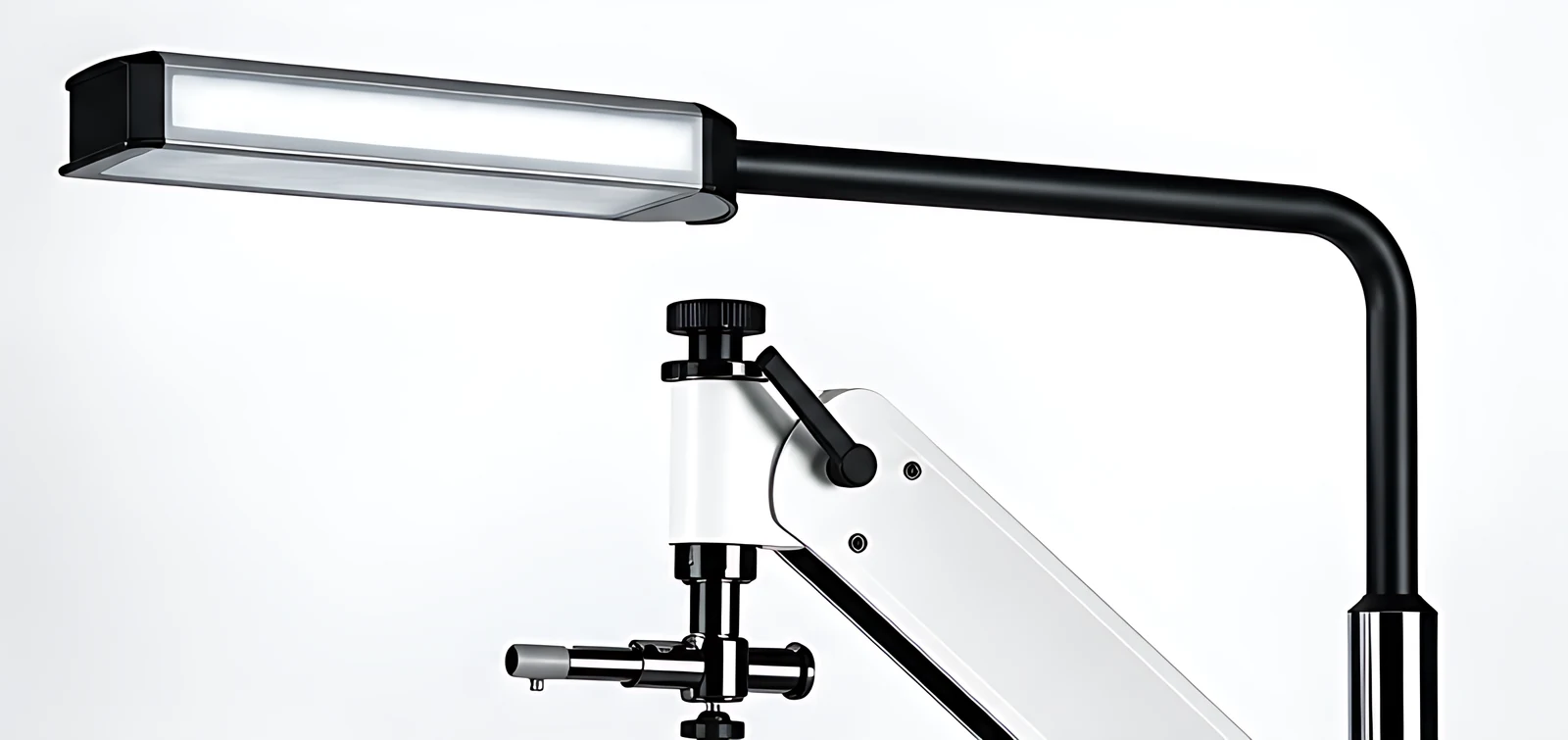 TG-510 — overhead lamp and instrument arm on the column